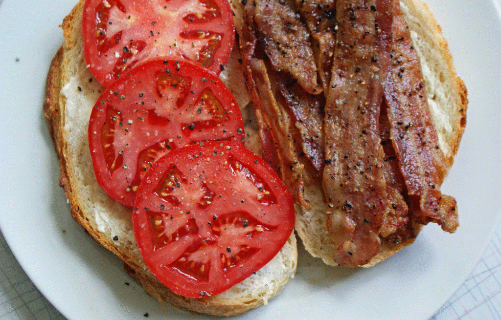 Bacon really enhances the flavor of a tomato sandwich.
