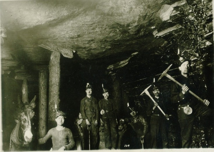 Vintage photo of miners taken underground.