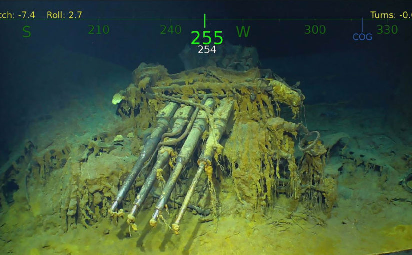 underwater wreck of an American ship showing an anti aircraft gun emplacement
