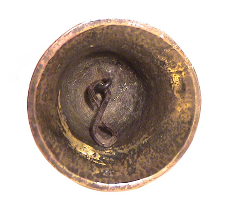 Link inside the bronze OOPART bell.
