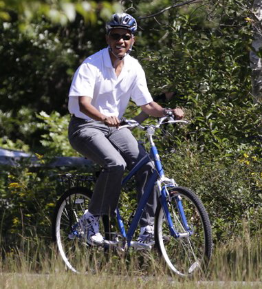 Obama on bicycle