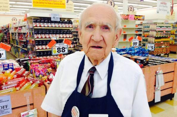 Old man now bagging groceries.