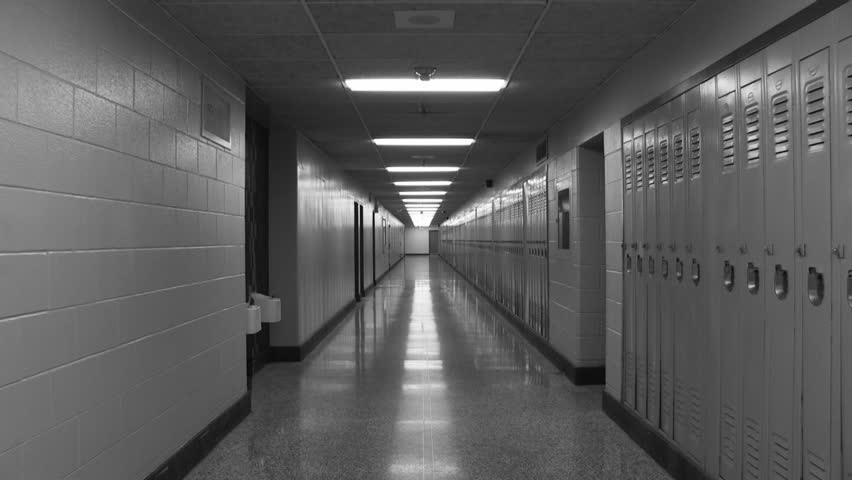 They walked down the empty school hallway.