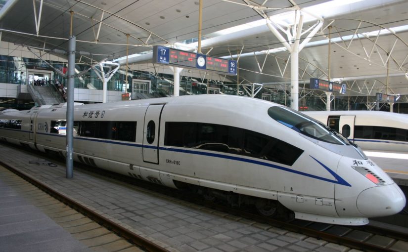 Chinese high speed rail train in a train station.