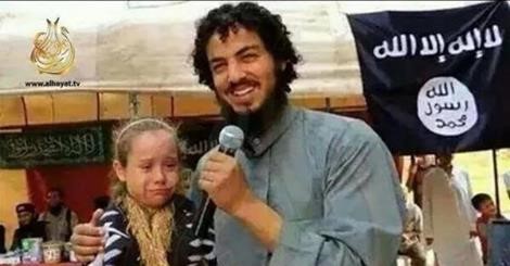 ISIS fighter with 7 year old captured girl.