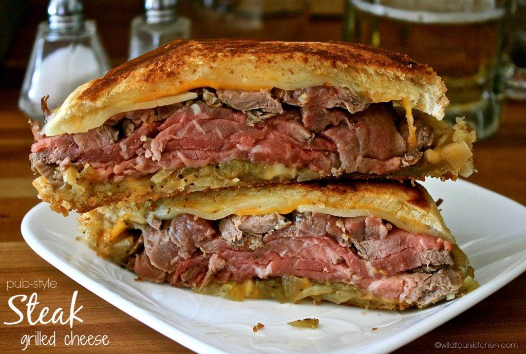 Delicious steak grilled cheese sandwich. It goes great with a nice hot creamy soup and icy frosty beer.