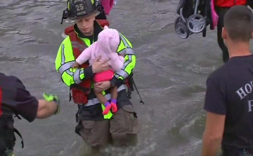 Rescue of a child during a flood.