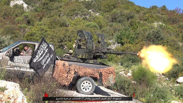 Former American truck, utilized by the ISS in Syria, showing a mounted AA gun.