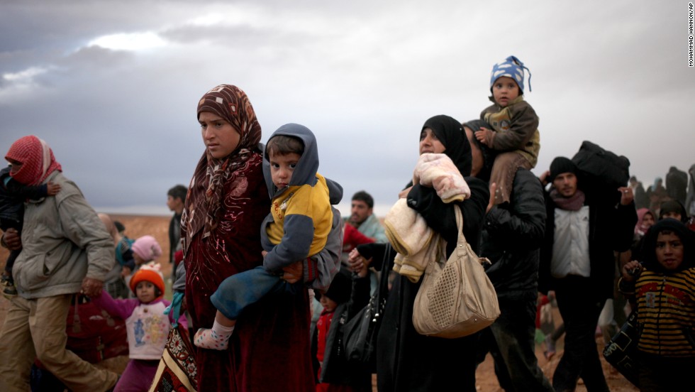 Refugees fleeing the ISIS in Syria. They gathered up their possessions and flee the battle and conflict zones.