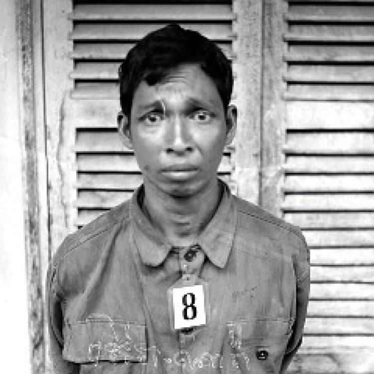 When Pol POt and his merry band of Marxists came to power in Cambodia, they disarmed the military, the police, the agencies and all the civilians. Then they collected them. Often still wearing their uniforms. They interviewed them to list their crimes against social Marxism, took their pictures and then executed them on the spot. This is what is coming to America. It is coming. Look into his eyes. He knew that he had minutes to live. What do you think was going through his mind? Was it how he wished that he didn't listen to his leader when he was told to hand in his weapon? Do you think it was regret for turning around and having his hands handcuffed? Was it when he was told to climb onto the truck?