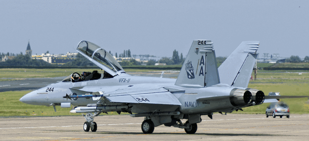The  first  fighter  aircraft  was  piloted  by  Commander  David   Fravor,  commanding  officer  of  Strike  Fighter  Squadron  41,   assisted  by  his  weapon  systems  officer  (WSO)  in  the  back   seat.  Lieutenant  commander  Jim  Slaight  was  aboard  the  second   jet  which  was  serving  in  the  role  as  a  wingman.  The  officers   were  training  aboard  two  FA-18F  Super  Hornets  in  a  routine   combat  exercise.
