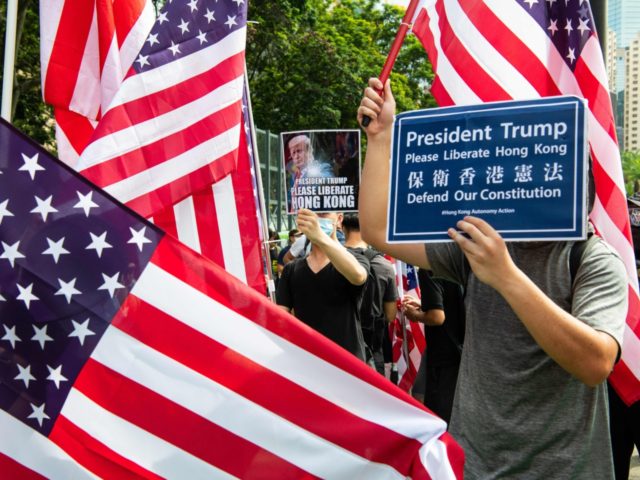 Protests in Hong Kong routinely carry the US flag and photos of Donald Trump.
