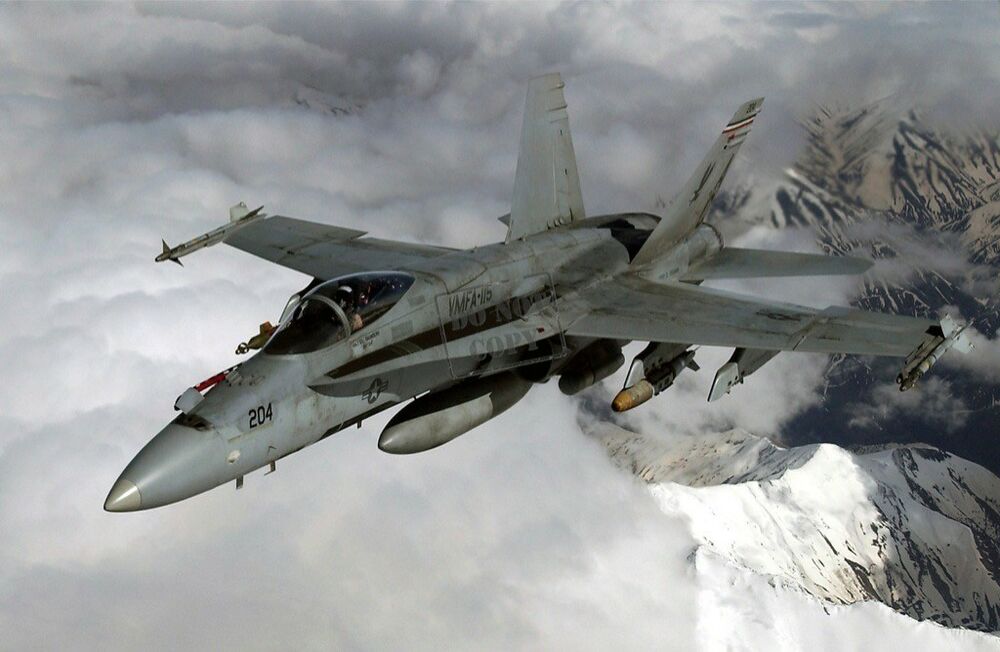 The McDonnell Douglas F/A-18 Hornet is a twin-engine, supersonic, all-weather, carrier -capable, multirole combat jet, designed as both a fighter and attack aircraft (hence the F/A designation).