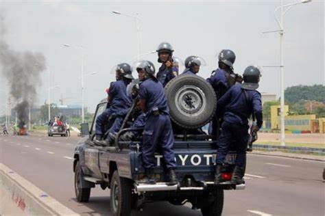 Congo National Police on their way to restore order in a town.