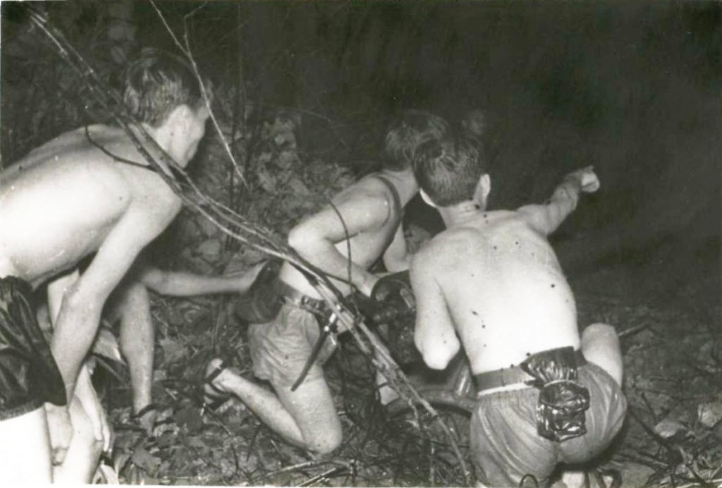 Viet Cong sappers approach an American Fire Base.