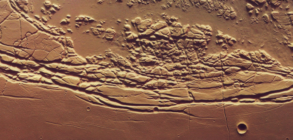 Mars, in the kasei valles sacra fossa region.