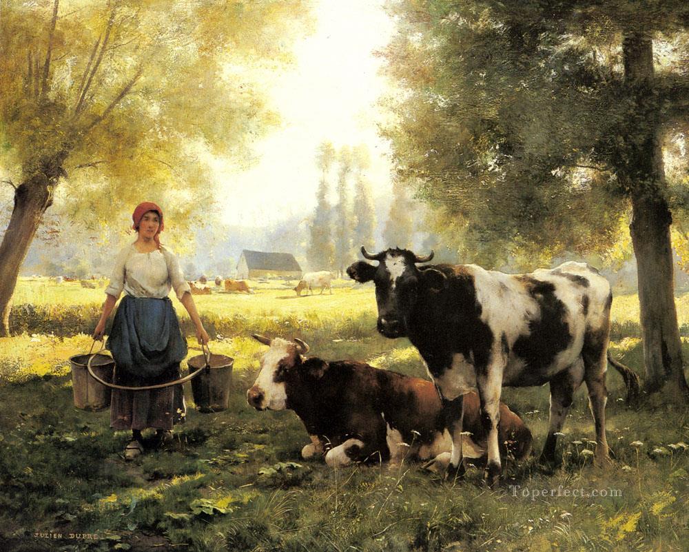 A milk maid and her cows.