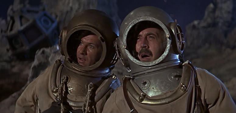 The team in their spacesuits in the movie "The First Men on the Moon".