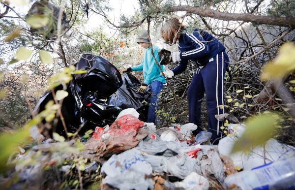 American Homeless picking their way through garbage.