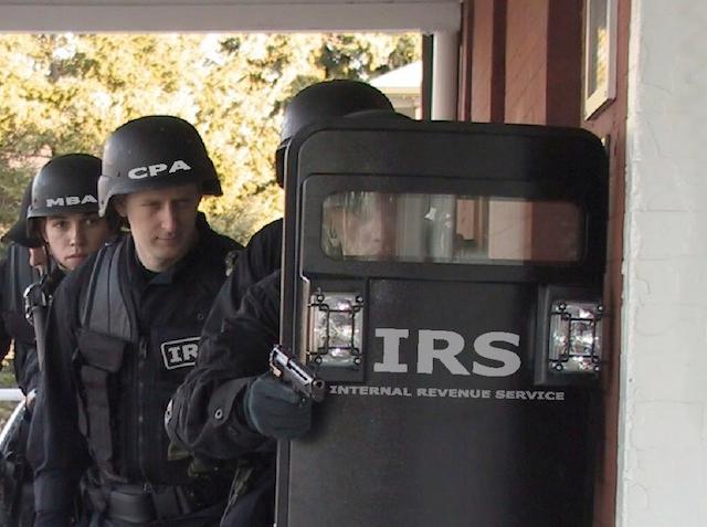 Friendly IRS making sure that you will not cheat your owners out of their money. You had best obey or else you and your family will be shot dead. It's all so very progressive and modern, don't you know!