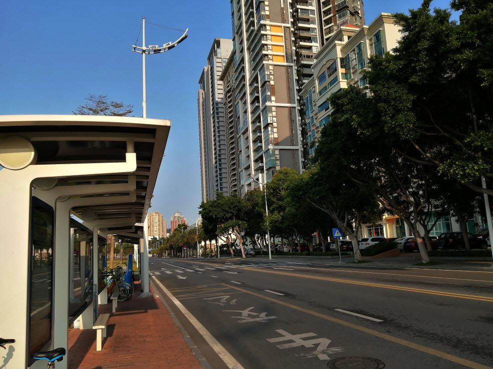 Bus station facing the apartments for the well-heeled.