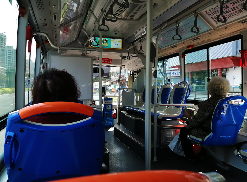 Quiet bus ride, with quiet passengers. Riding on a quiet street. Most people were either inside, working remotely to their offices, or getting things fired up int he factories. Very few restaurants were open.