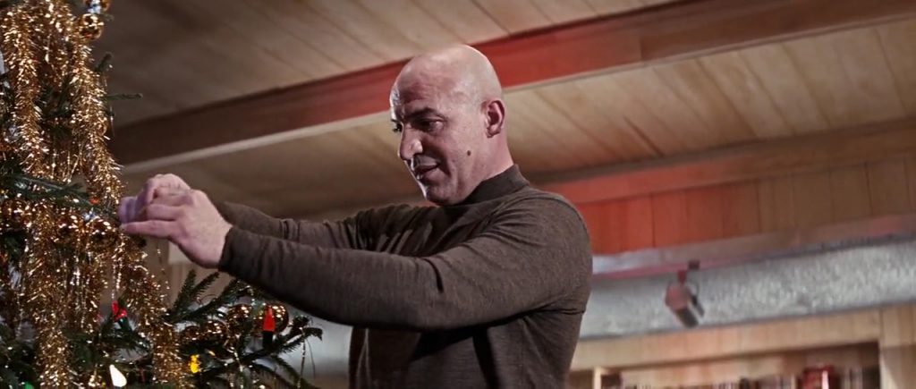 Who  knew that one of the grittiest Bond films of all time had a scene of  super-villain Ernst Stavro Blofeld decorating a Christmas tree?
