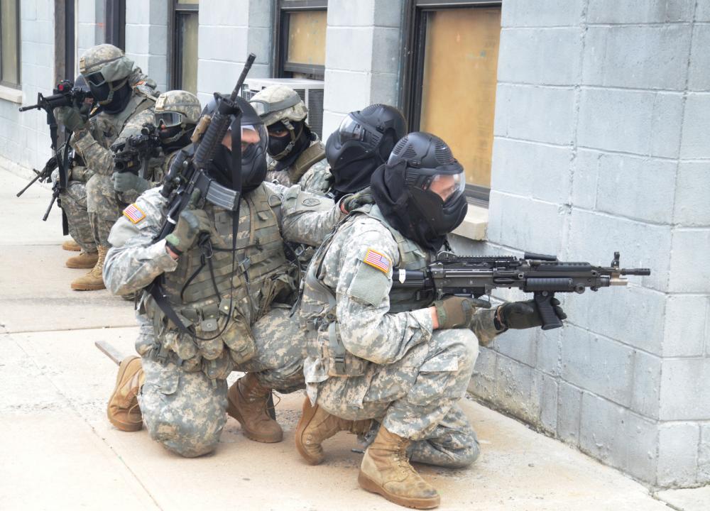 American soldiers, train alongside the DHS, in these American sized towns wearing full spectrum bio-warfare gear.