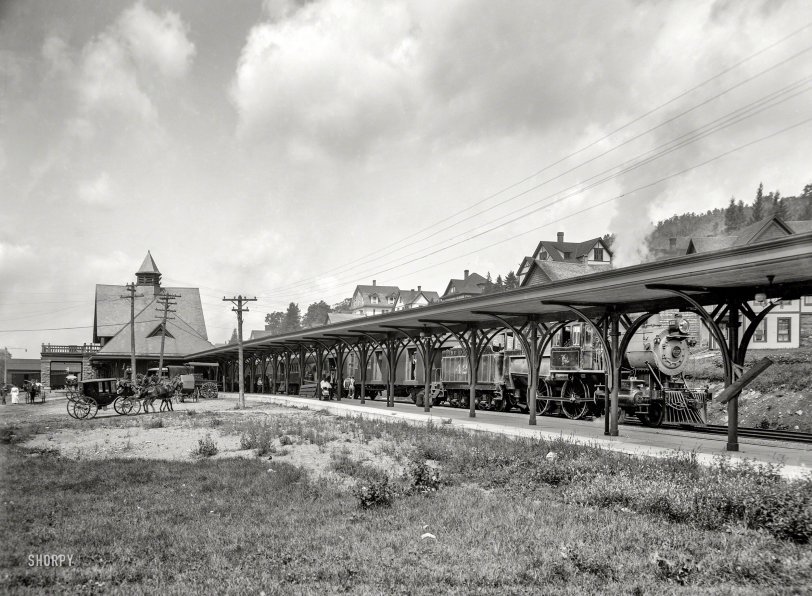 Circa 1905. "Saranac Lake central station, Adirondacks, N.Y." With a locomotive of the Delaware & Hudson Railway. 8x10 inch glass negative
