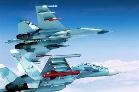 Chinese fighters with anti-ship missiles.