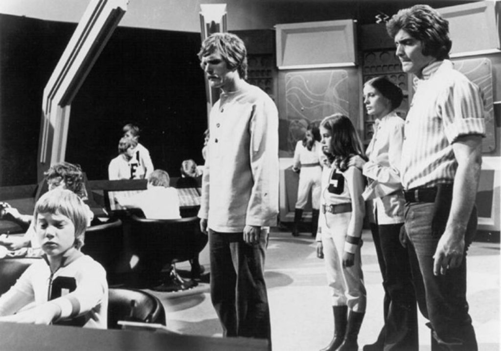 Scene from the 1970's televisions series 'The Starlost". Here, Rachael, Deven and Garth are at the "After-bridge" of the Space Arc where children are being taught on how to operate the spacecraft.