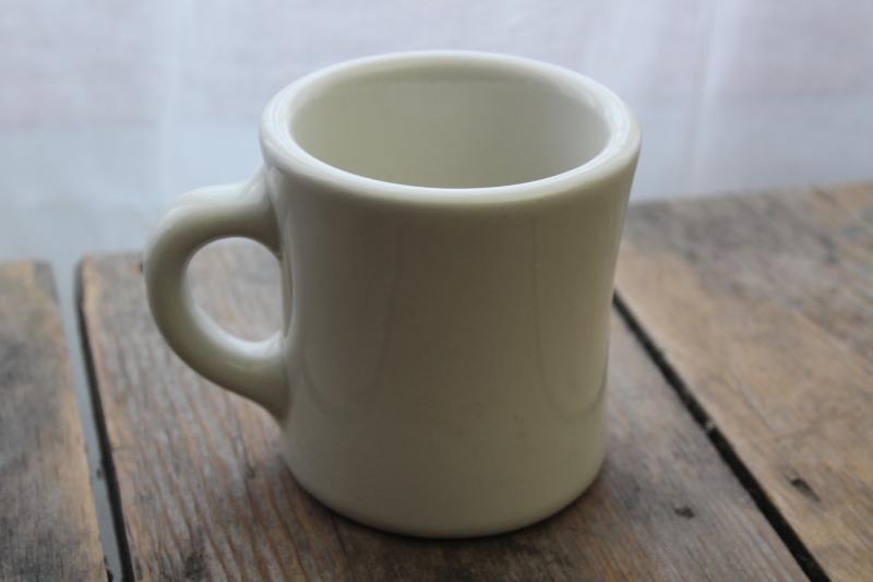 A vintage heavy ivory white ironstone china coffee mug. This is what coffee was intended to be drunk out of.