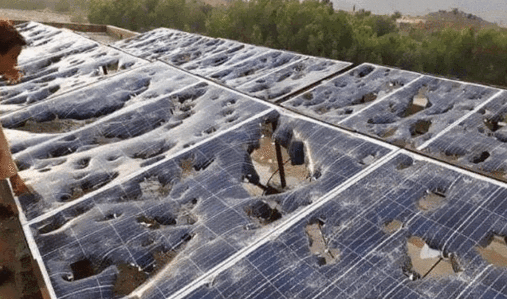 Solar power panels hit by a hail storm.