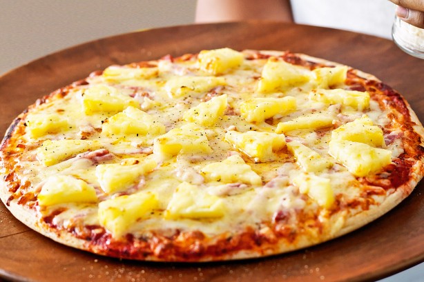 Bacon, pineapple and cheddar pizza.