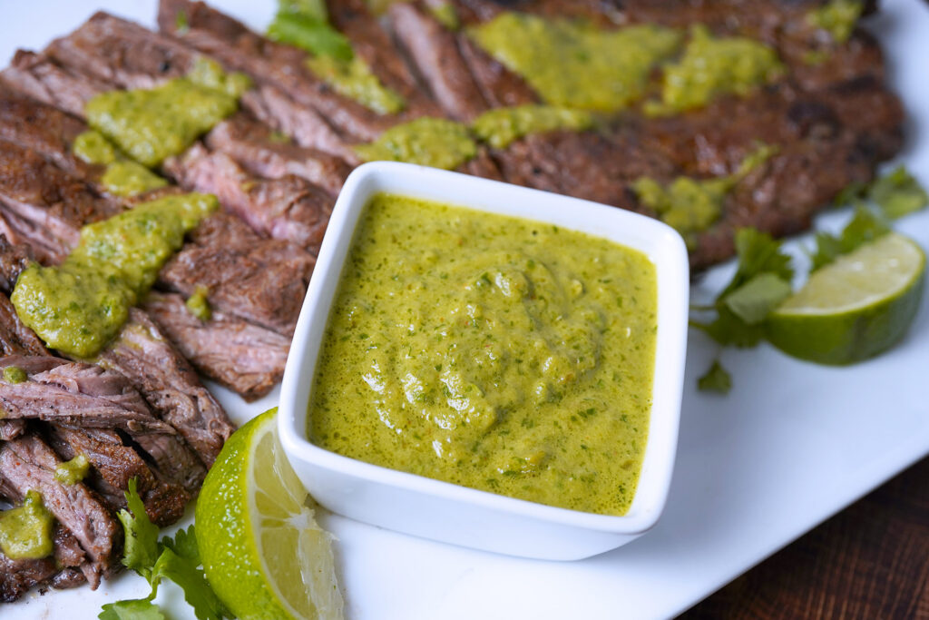 skirt steak with hatch chile sauce sauce closeup 1024x683