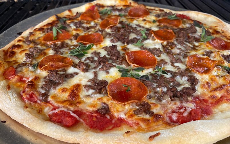 grilled ground beef pepperoni pizza detail 8da36b1f